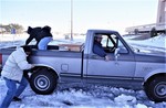 Students help truck stuck in snow