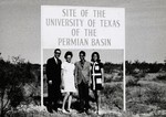 President Amstead and Family Under the UTPB Site Sign